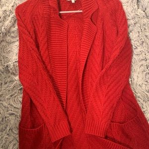 Red , long , open front sweater with pockets